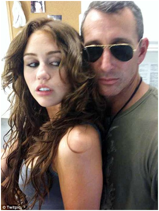 062509_1520_MileyCyrusp2.png